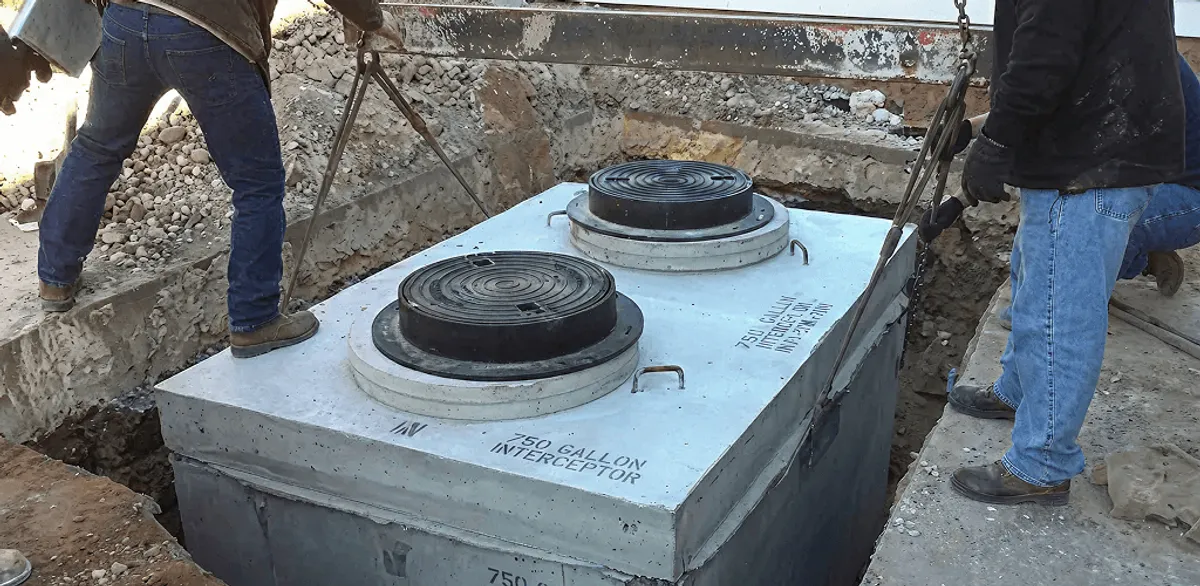 Grease trap installation for a commercial property drainage system in Syracuse, NY