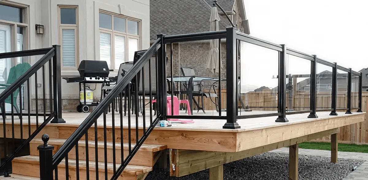 Handrail installation on a deck staircase for safety and code compliance in Syracuse, NY
