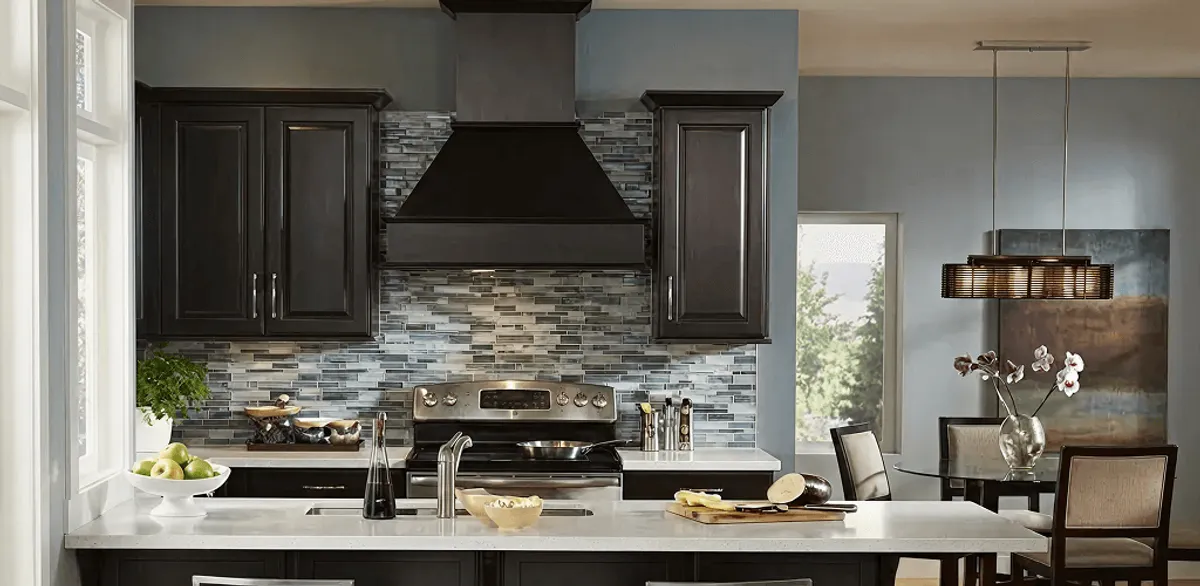 Kitchen cabinet painting and refinishing in a modern kitchen in Syracuse, NY